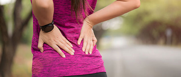 Woman suffering from low back pain Oakland