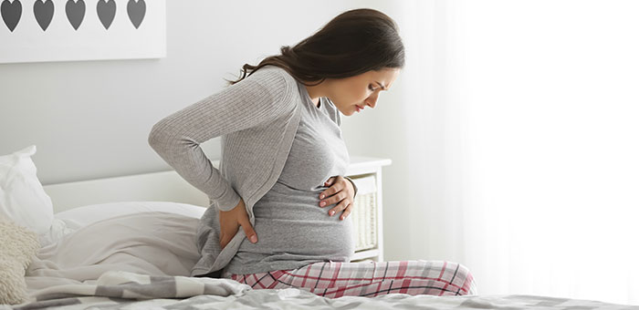 Patient suffering from Pregnancy Pain in need of chiropractor in Oakland