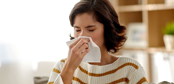 Patient suffering from allergies or asthma in need of chiropractor in Oakland